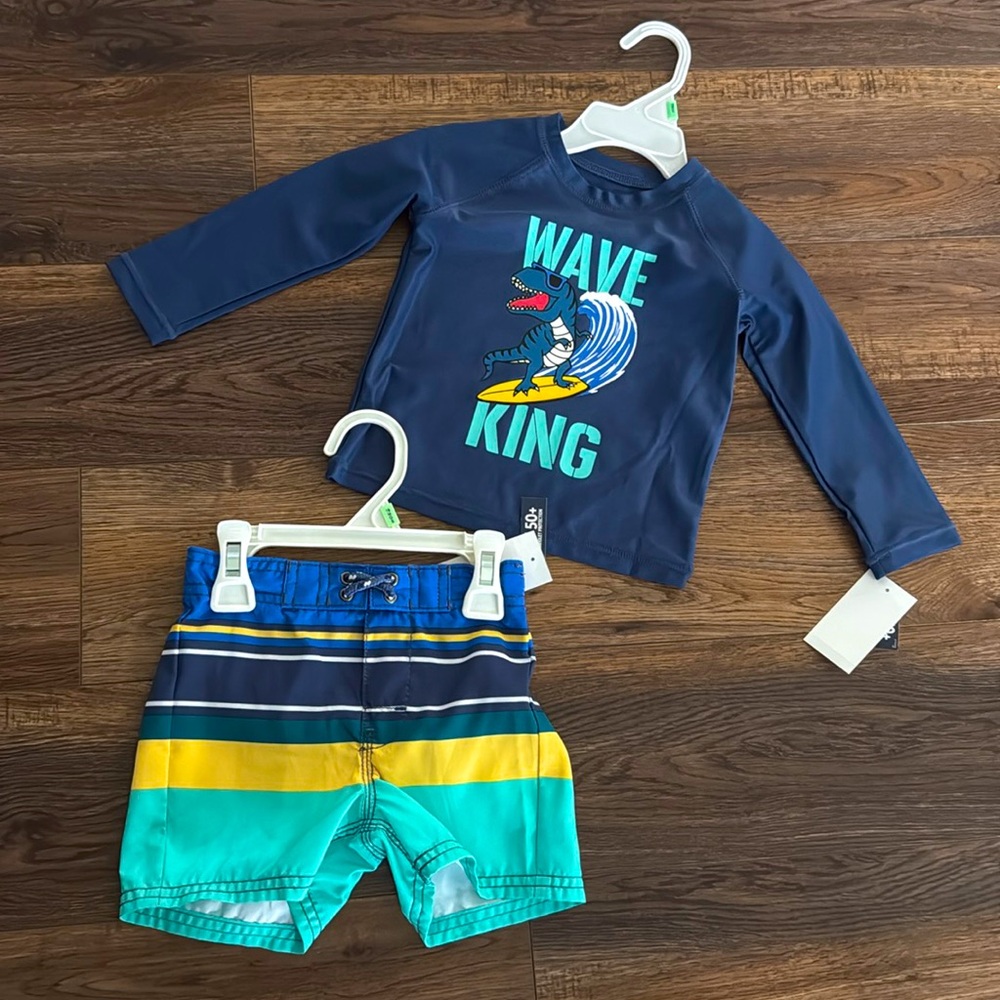 Carter’s swim trunk and matching swim shirt. Swim shorts. Size 18 months. SPF 50
